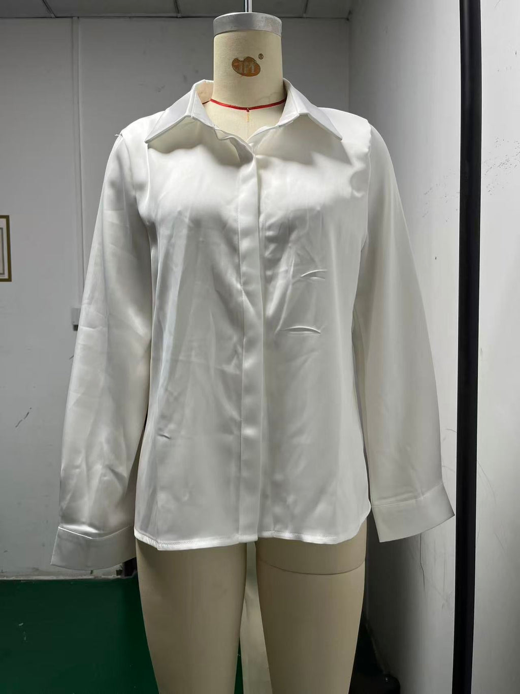 Women's Collared Blouse with Button Closure and Curved Hem