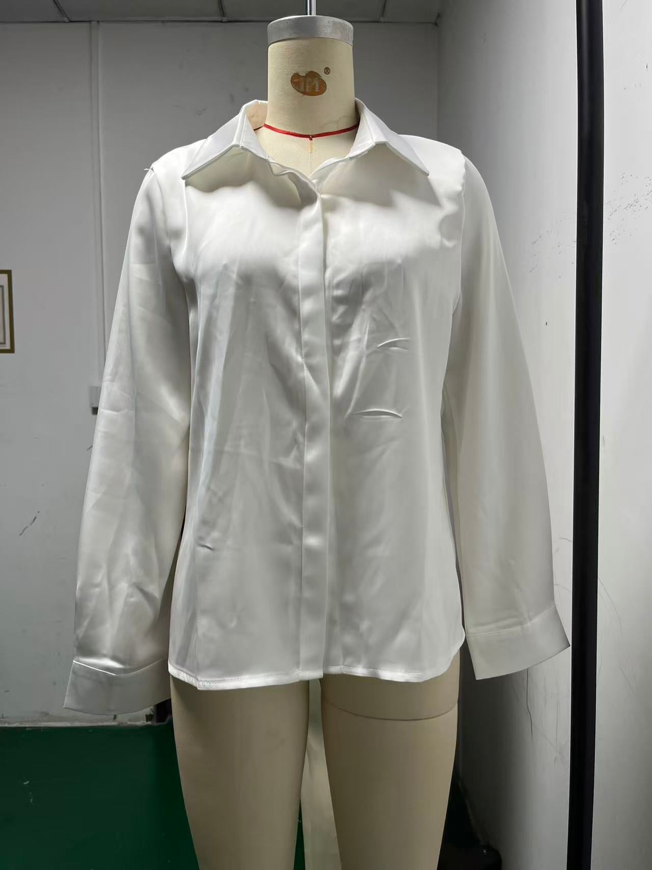Women's Collared Blouse with Button Closure and Curved Hem