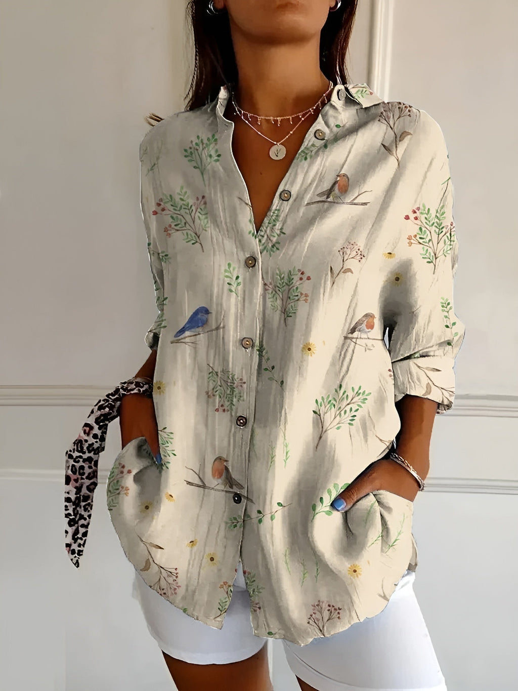 Women's Floral Blouse with Pleated Front and Button Closure