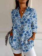 Women's Floral Blouse with Pleated Front and Button Closure