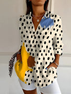 Women's Floral Blouse with Pleated Front and Button Closure