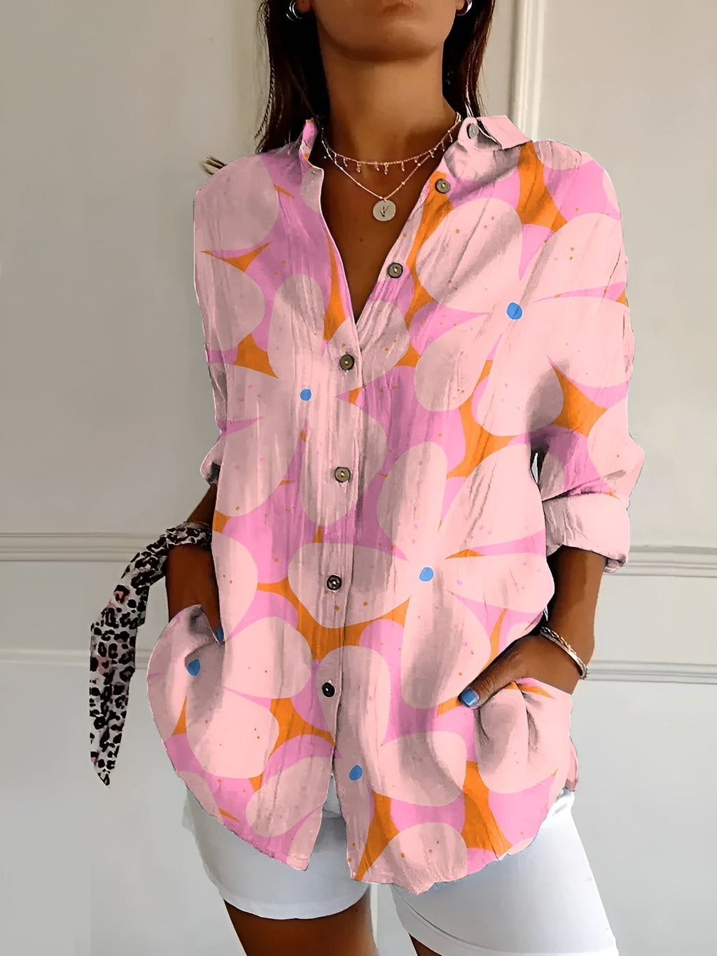 Women's Floral Blouse with Pleated Front and Button Closure