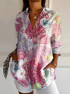 Women's Floral Blouse with Pleated Front and Button Closure