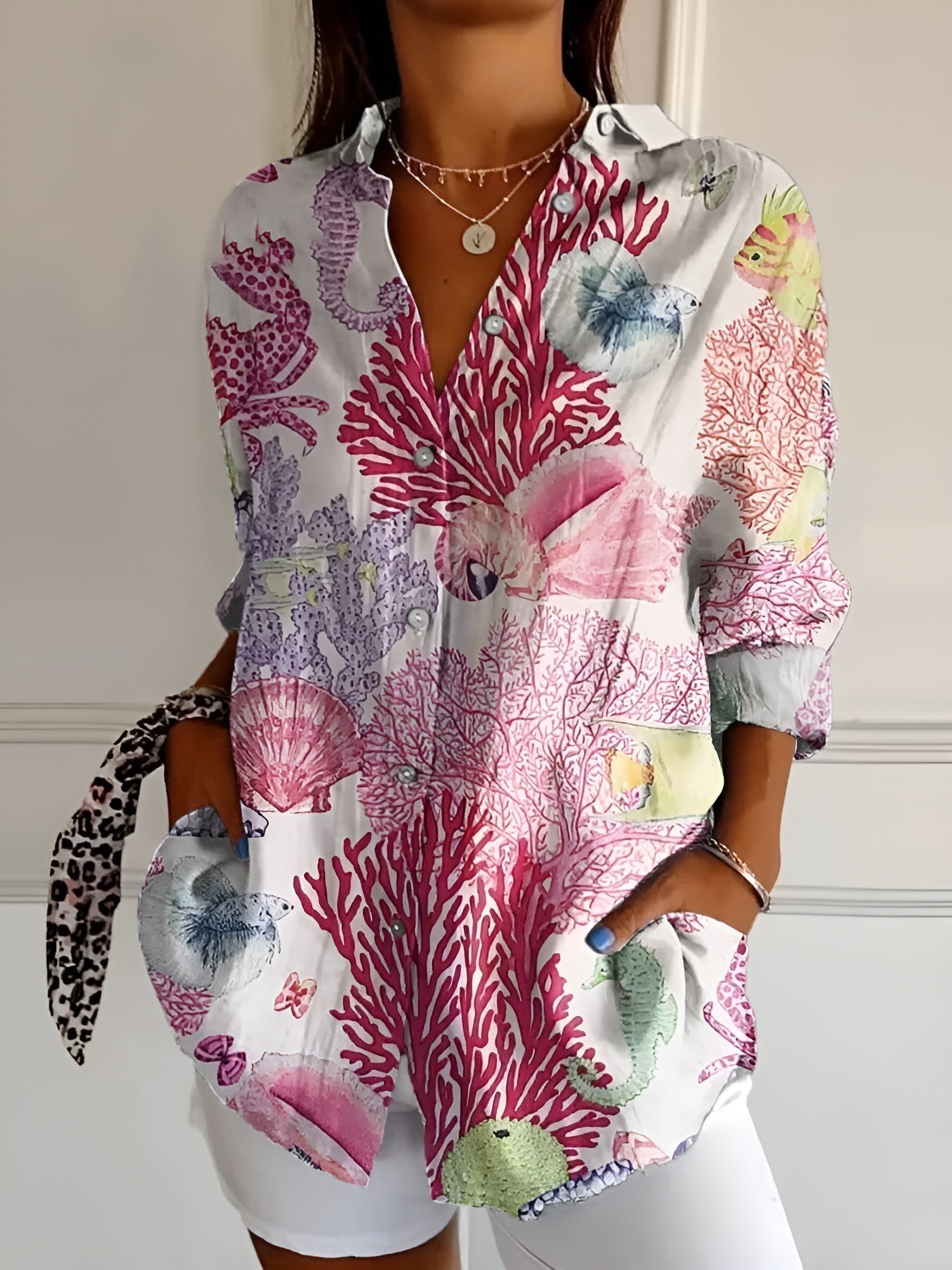 Women's Floral Blouse with Pleated Front and Button Closure